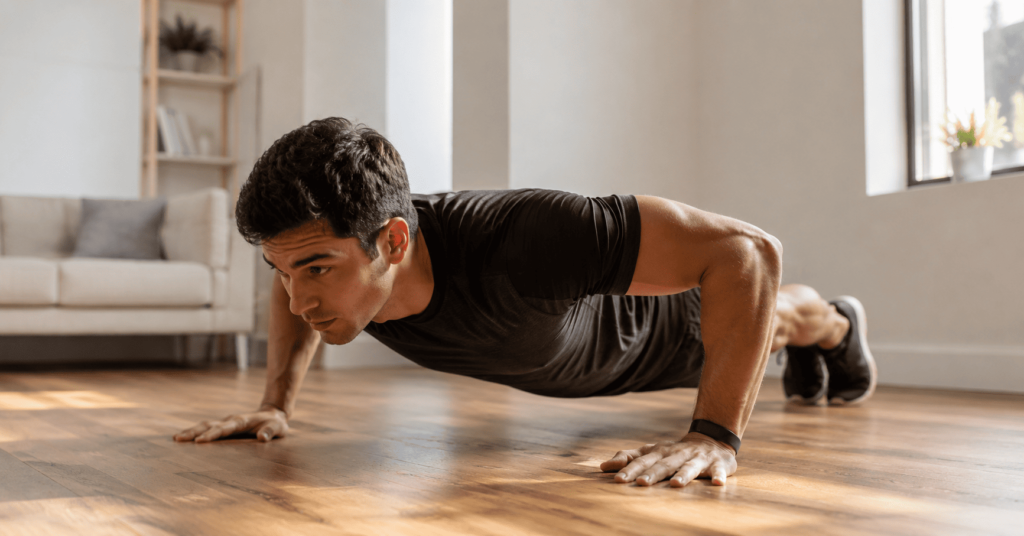 A man is doing push-up at home