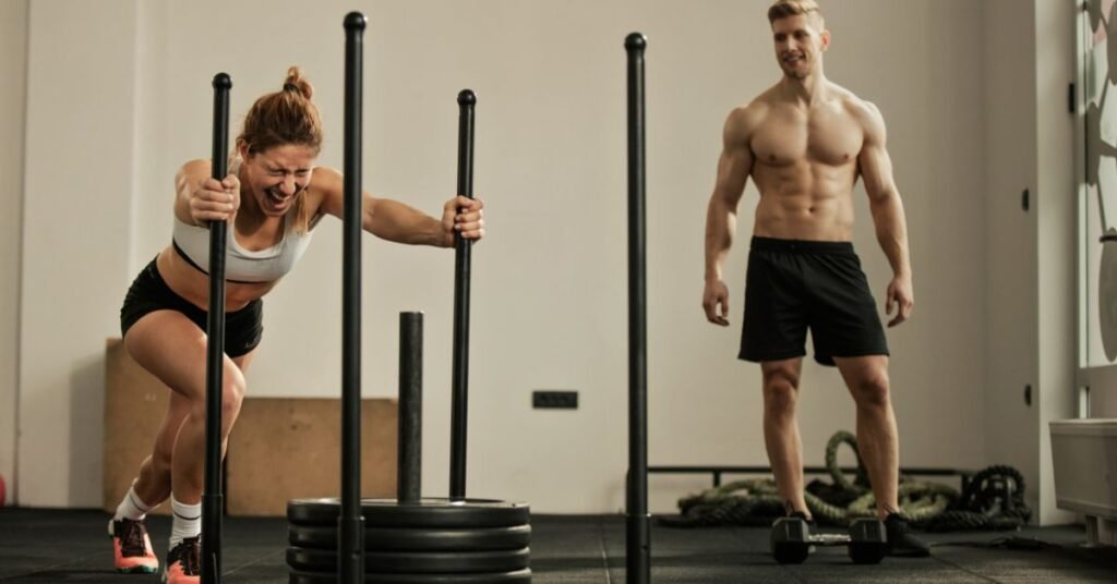 Sled Push vs Squats: Which Builds More Muscle With Less Recovery Time?